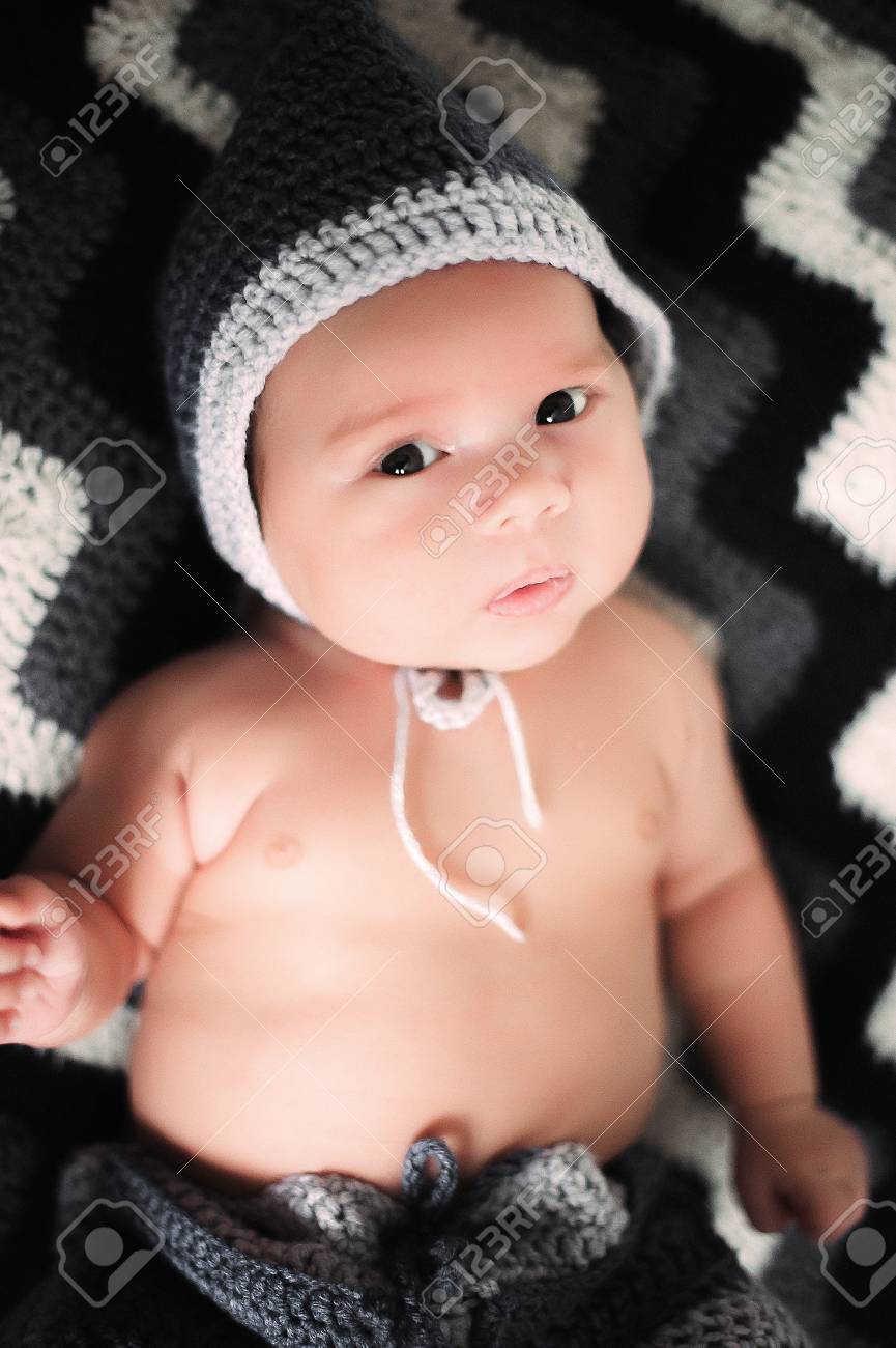 Crochet Baby Viking Hat Pattern Cute Ba Boy Lie Naked On A Beige Background Wearing A Crochet